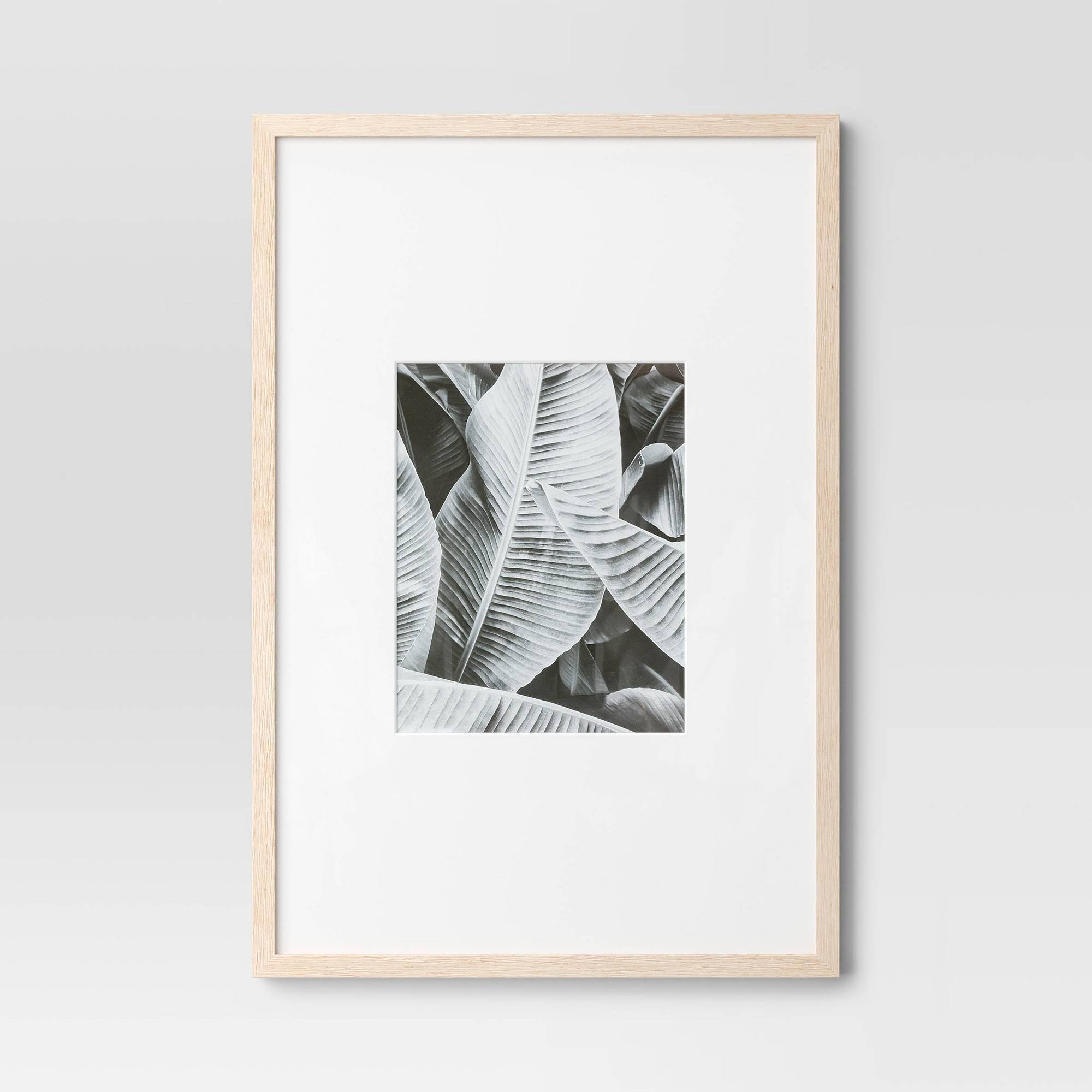 adc7839eb737d7f11e6333b627f128e5bda394d06caaa5dbf31e57af6af18ebf.jpg 20" x 30" Matted to 11" x 14" Poster Frame Light Wood - Threshold - Image 1