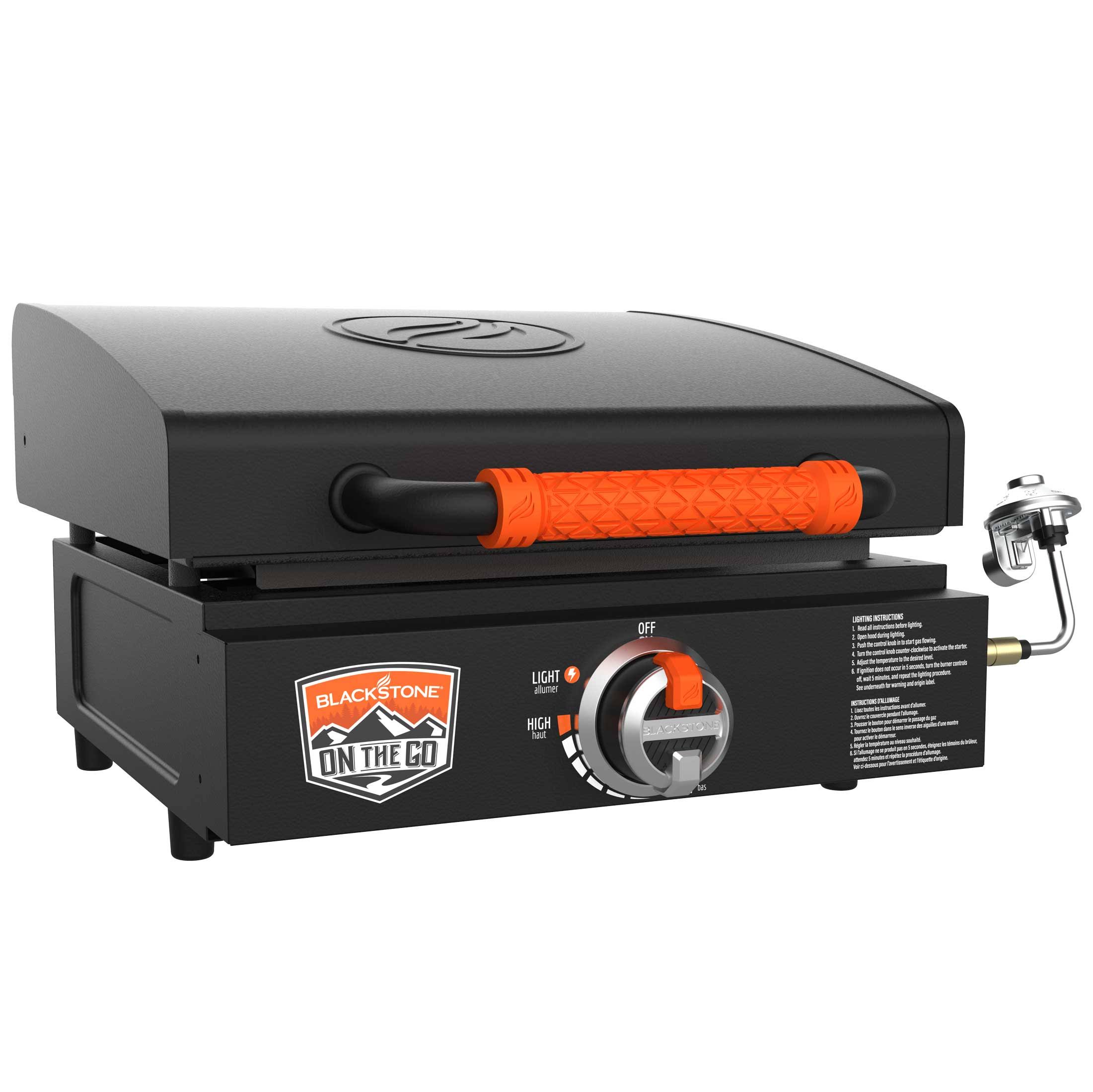 aefdfda10a4a9de5182410829596bdd439285cc23d422f7b2ebfecf82dcc7a1d.jpg Blackstone 1900 on The Go 17" Tabletop Griddle with Hood - Image 1