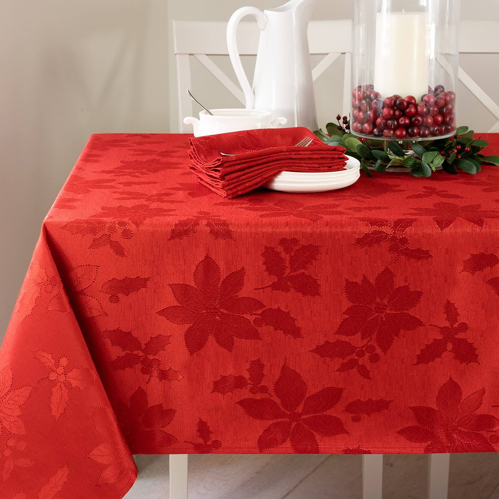 b52e7bbb0a23ca65d8e24552fe3642f664235b601ae8c71830adef7ef9de7c2a.jpg Benson Mills Poinsettia Legacy Damask Christmas Tablecloth (60" x 120" Rectangular, Red) - Image 1