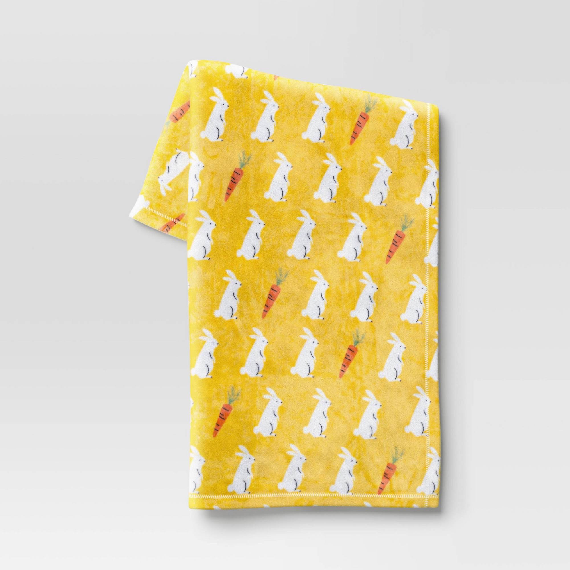 b9359d49b1e10c71d803809d4166777281265aa0692a4e6c4c922e8f59bbada5.jpg Printed Plush Bunny Easter Throw Blanket Yellow - Room Essentials - Image 1