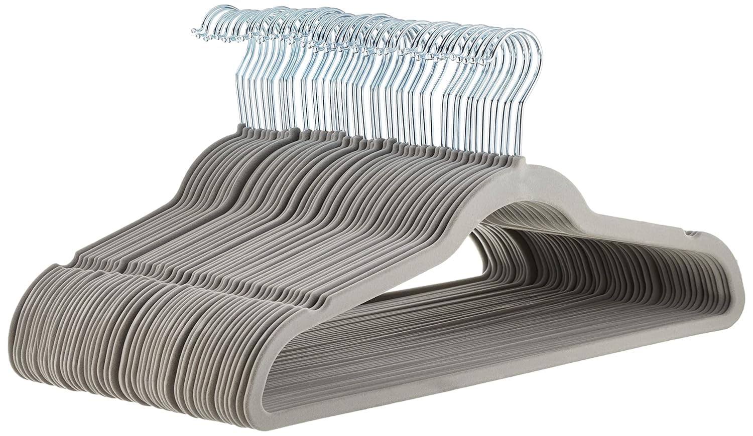 bcabbf8819791312fce63b15ec3fe005e994aa519b82fc78b431b698c2ce2801.jpg AmazonBasics Velvet Suit Hangers - 50-Pack, Grey - Image 1