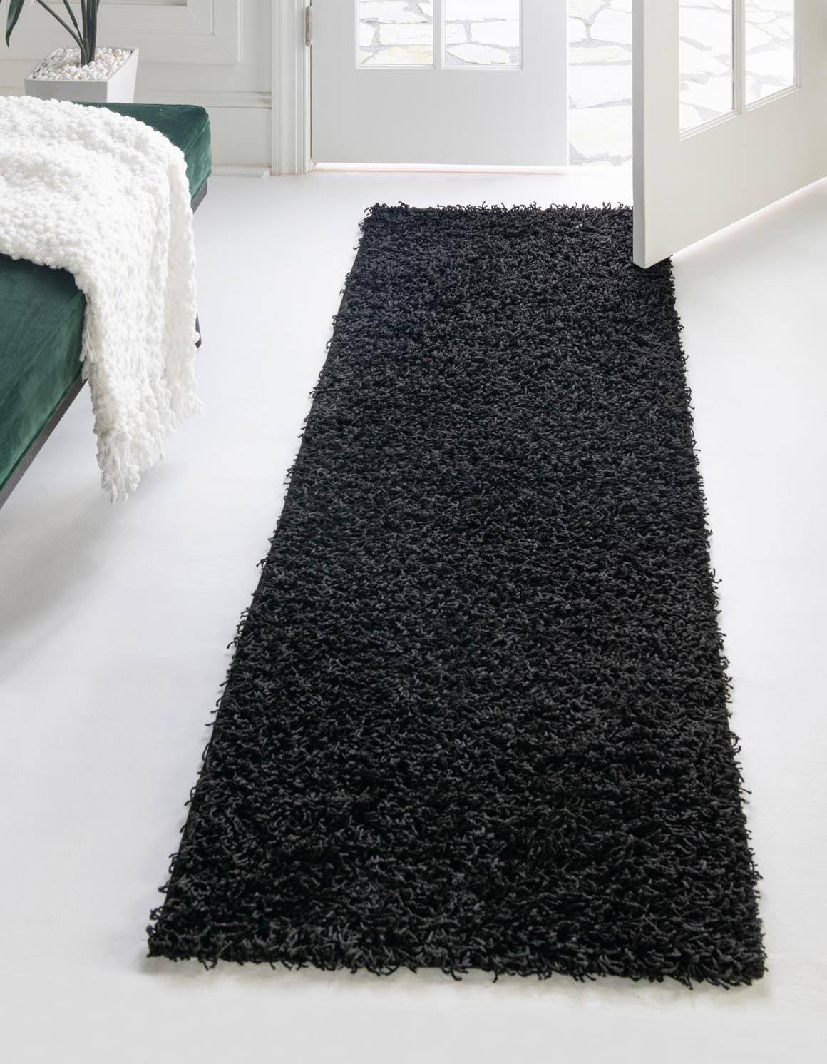 bcc97a6ee176c0193fa2b9bbe13d6fbb9b3e0a4b9cfd52bc5e048ef3bc91b70a.jpg Comfort Solid Shag 6 ft Runner Black Area Rug - Image 1