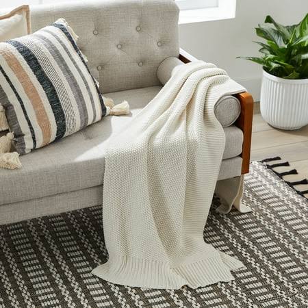 bf8a58a91553c33f3f3f4f2c2663183b2f829968a3ffe482b7a24ac5056725c2.jpg Better Homes & Gardens Solid Knit Throw Blanket, Papyrus, Standard Throw - Image 1