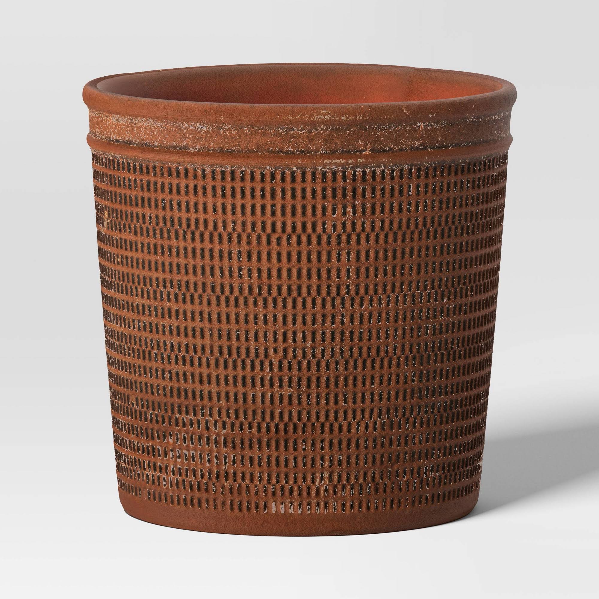 c2108c895bdc3582fd60d3c9c03961e44723bffa130465553a2e899a791e1896.jpg Weathered Texture Ceramic Indoor Outdoor Novelty Planter 1 Planter Pot Brown 6"X6" - Threshold - Image 1