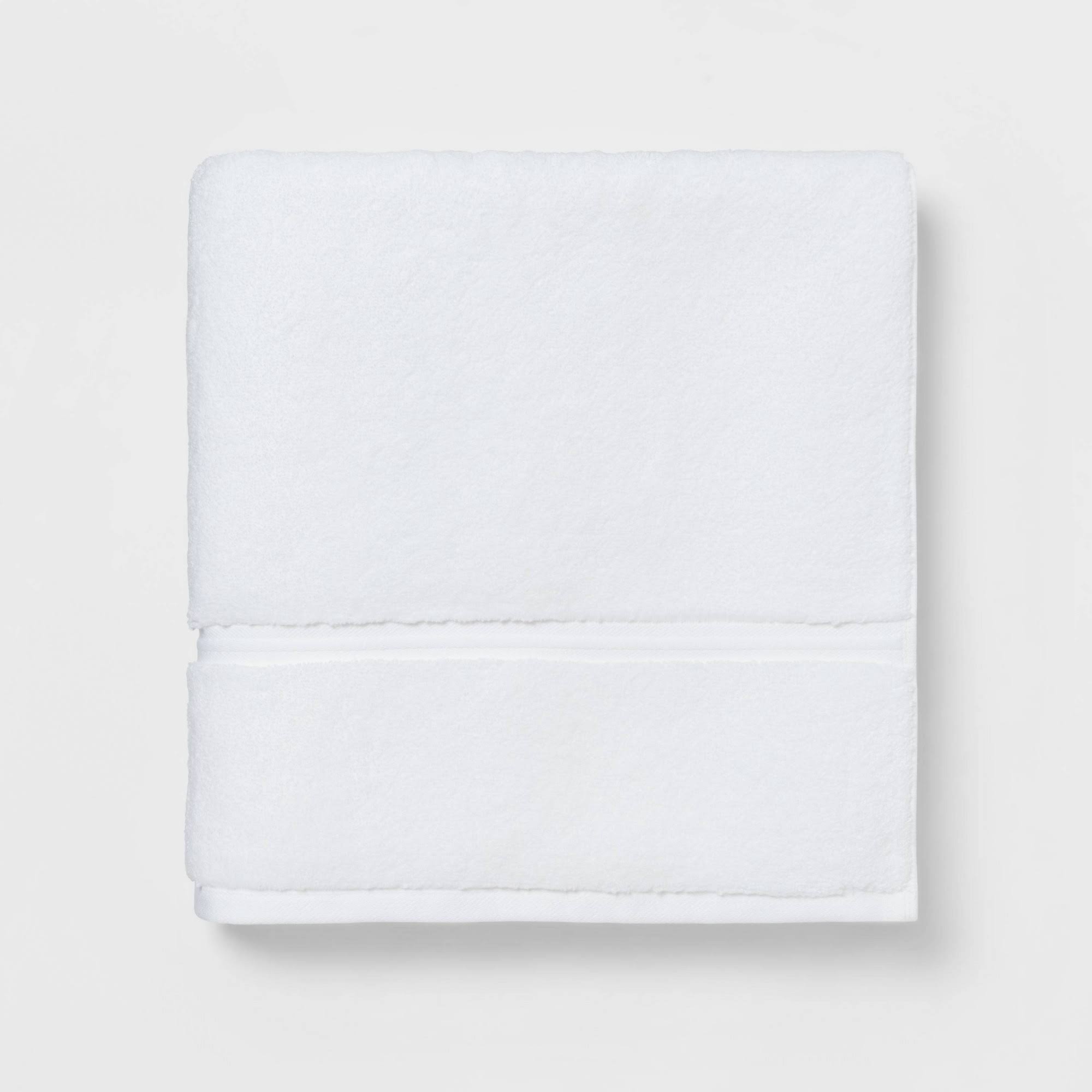 c282d3a0241db8f0b13ef3408341464c22713f7721aa8bacf274472fc13185ea.jpg Spa Plush Bath Towel White - Threshold - Image 1