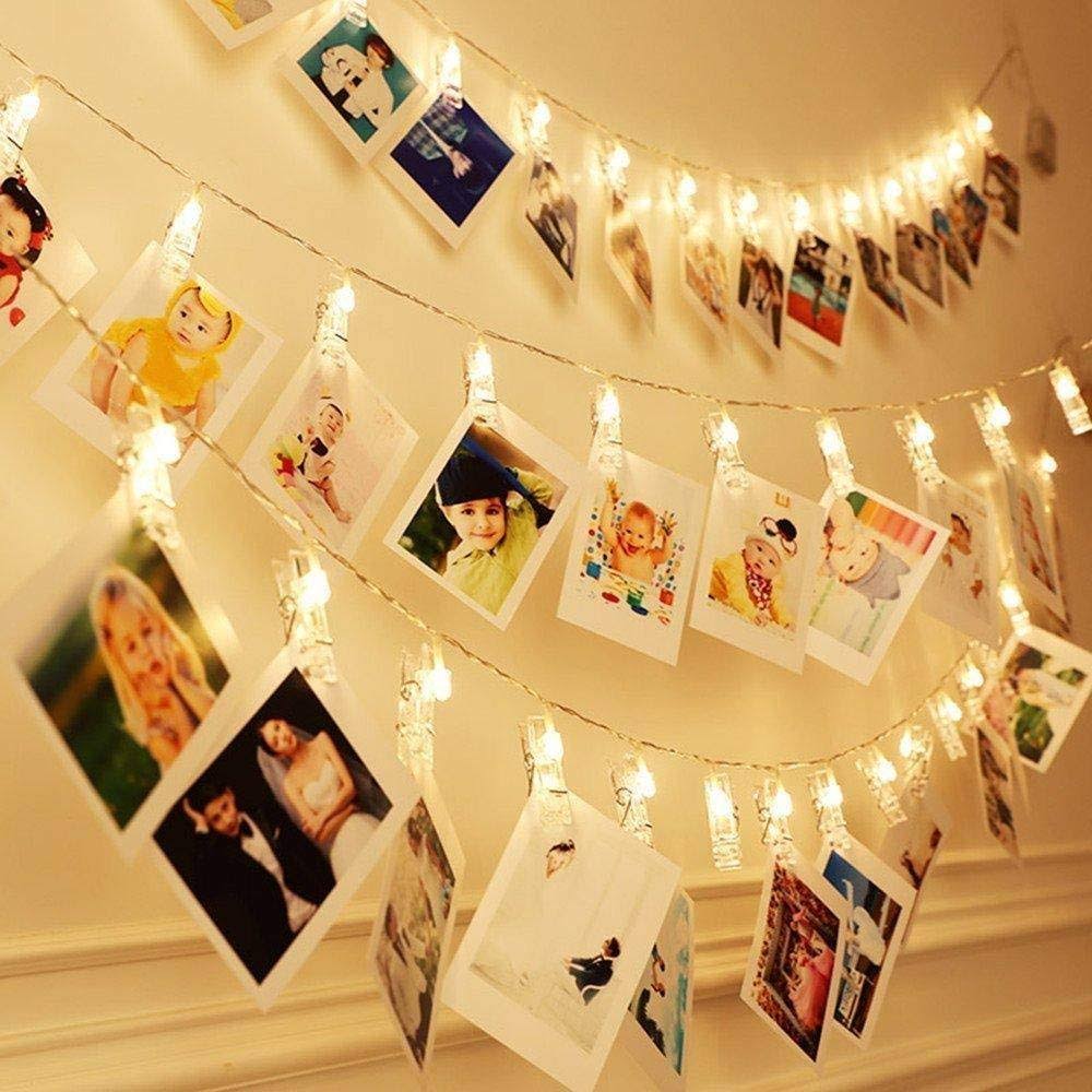 c2ab17036b08bdacdfd56b7686fdaf3b10db250906ee62ebd755eba2e05d8b7a.jpg Dopheuor LED Photo Clip Copper String Lights Starry Fairy Warm White Lights Battery Powered for Hang Pictures Cards Bedroom Wall Decorations - Image 1