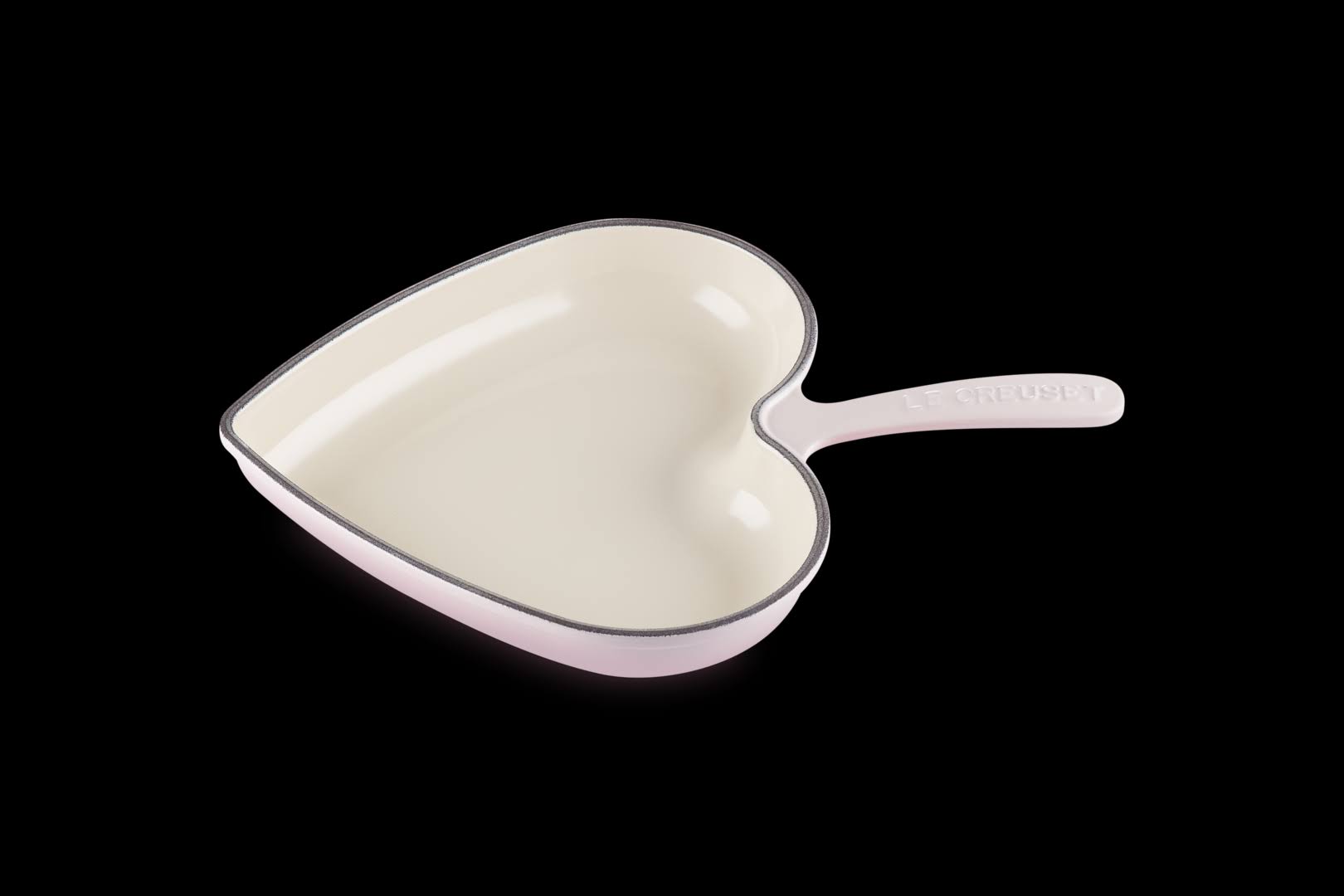 c4eacb08363950b02a549776503ea12a3e91d44a1e16f0f241d6f7161741bb77.jpg Le Creuset Enameled Cast Iron Heart Skillet | Shell Pink - Image 1