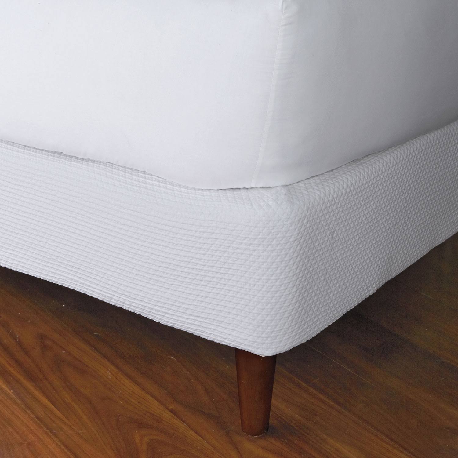 c6bb8a33acfe6ca51b8d654769daff346ac5f6e62e821b0e9752e108bf844d88.jpg Madelyn Egyptian Cotton Matelasse Box Spring Cover - White Size Twin | The Company Store - Image 1
