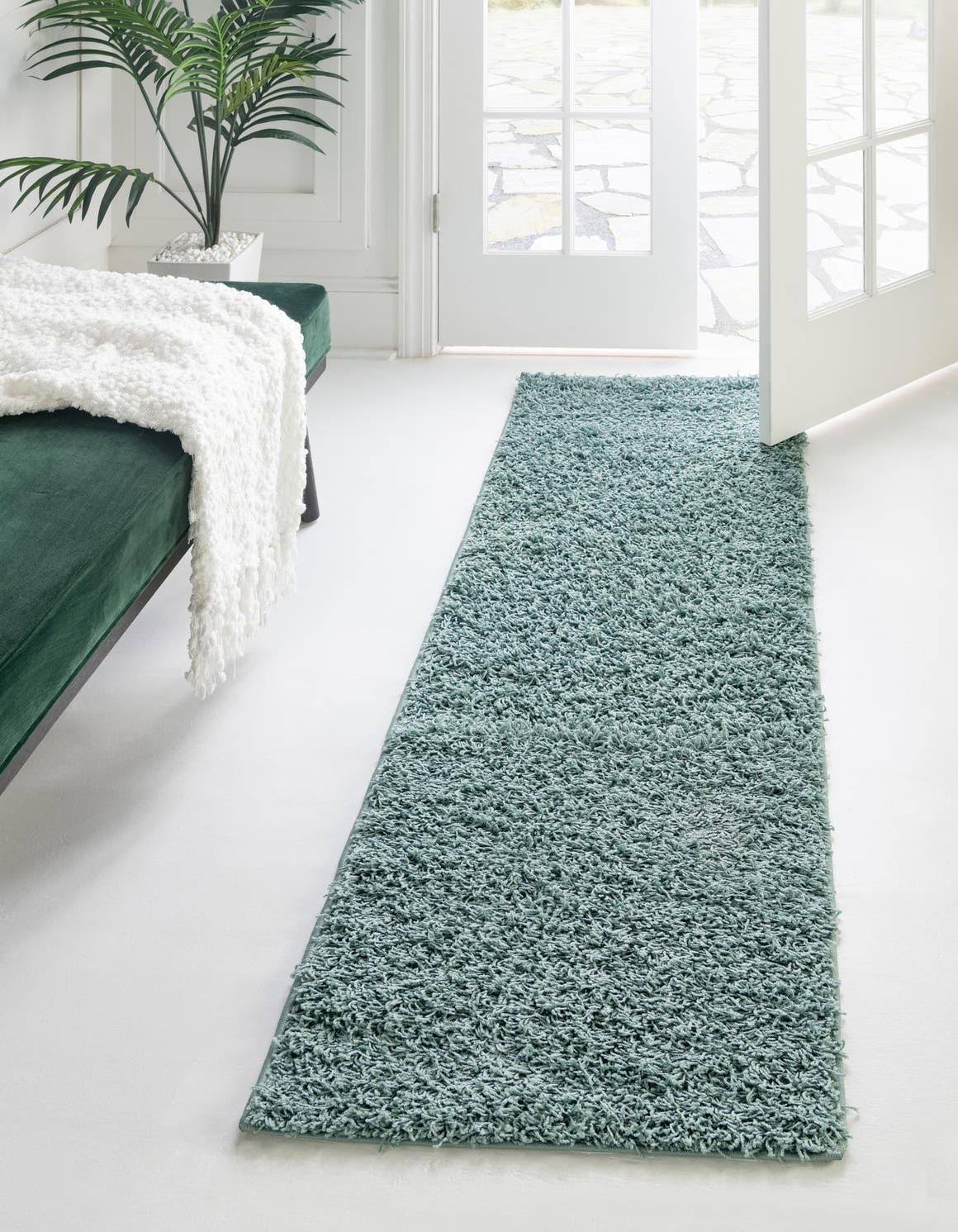 c809795493e8312e6b6a386889165a3e1d07c460a76f53f1d2bf3a745342026e.jpg Comfort Solid Shag 60cm x 245cm Runner Blue Area Rug - Image 1