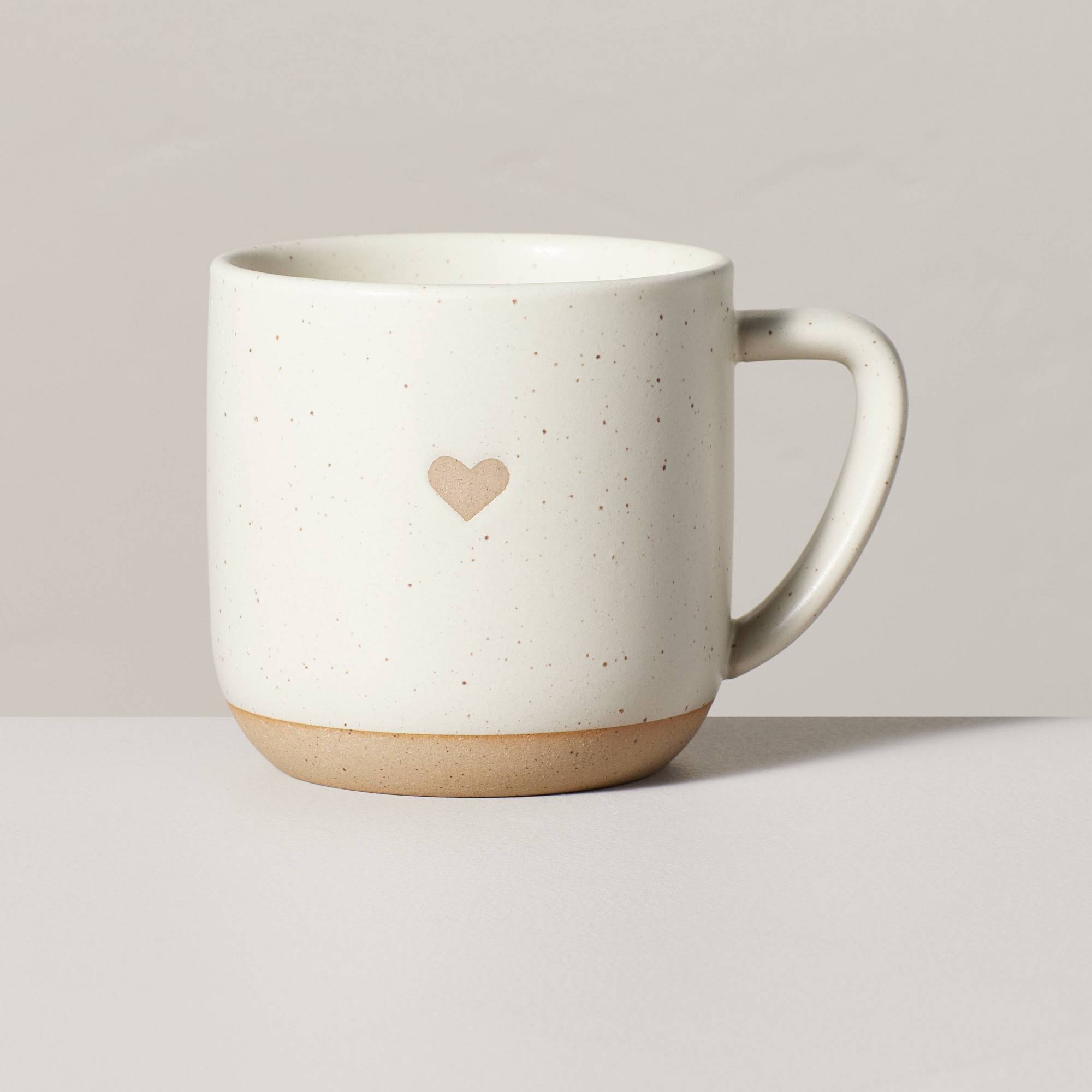 c82ba6fc0c74a8b6ef3382cccf21dc2c55a8927028eab9a4b99599db4bc16128.jpg 12oz Stoneware Heart Mug Cream/Clay - Hearth & Hand with Magnolia - Image 1