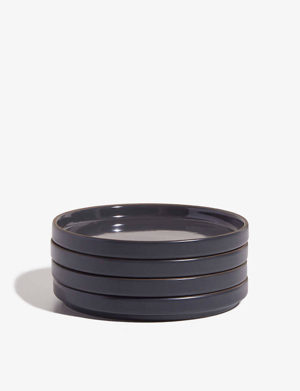 ca13500e385fbfee54e23e97886096217d787e2c2a91fa7d86032794970b10e7.jpg Our Place Char Demi Ceramic Plates Set of Four - Image 1