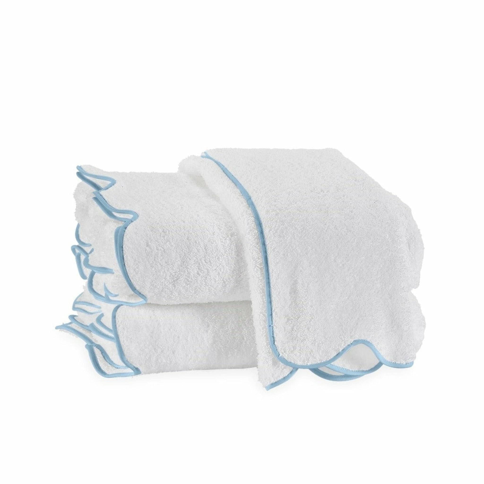ce10e43fef626df46f49e1f3ec8d31e2de559088eeea898a7782523f79fc56bd.jpg Matouk Cairo Scallop Guest Towel - Light Blue - Image 1