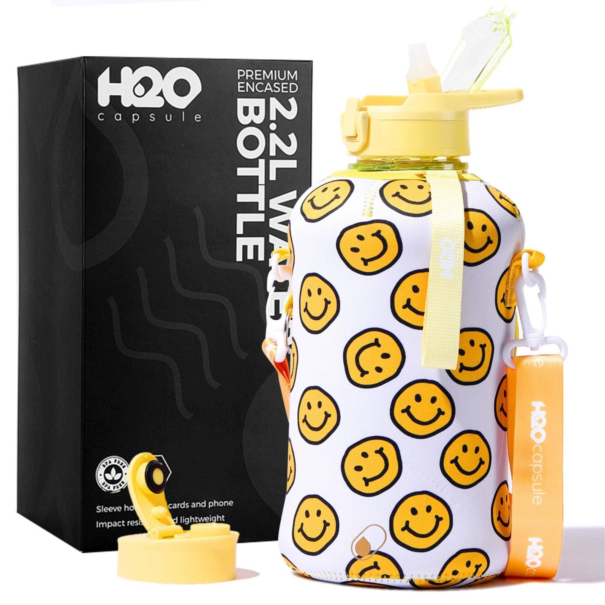 d2b0e8026eb5efe0fdf41c56383cae22e3fe9fc9238700673678402510b4f6ba.jpg H2O Capsule 2.2L Half Gallon Water Bottle with Storage Sleeve and Covered Straw Lid ÿ BPA Free Large Reusable Drink Container with Handle - Big - Image 1