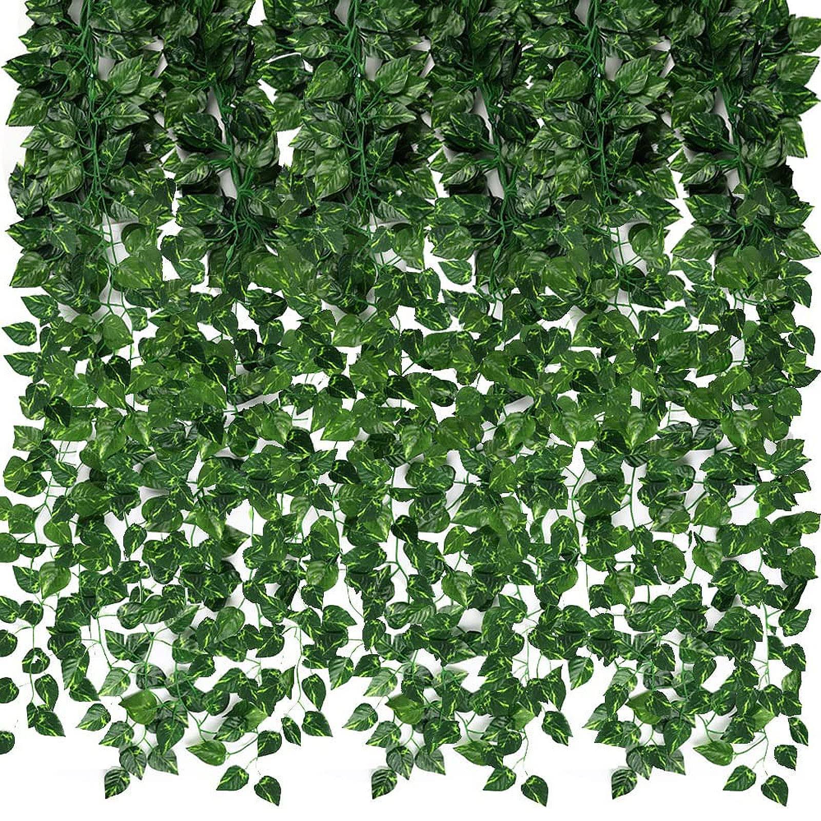 d52cb0974f378ae6b7acb2ba08b7ea63ccdf3fce9085ee0c6c939011a651088a.jpg CEWOR 24 Pack 173ft Artificial Ivy Greenery Garland, Fake Vines Hanging Plants - Image 1