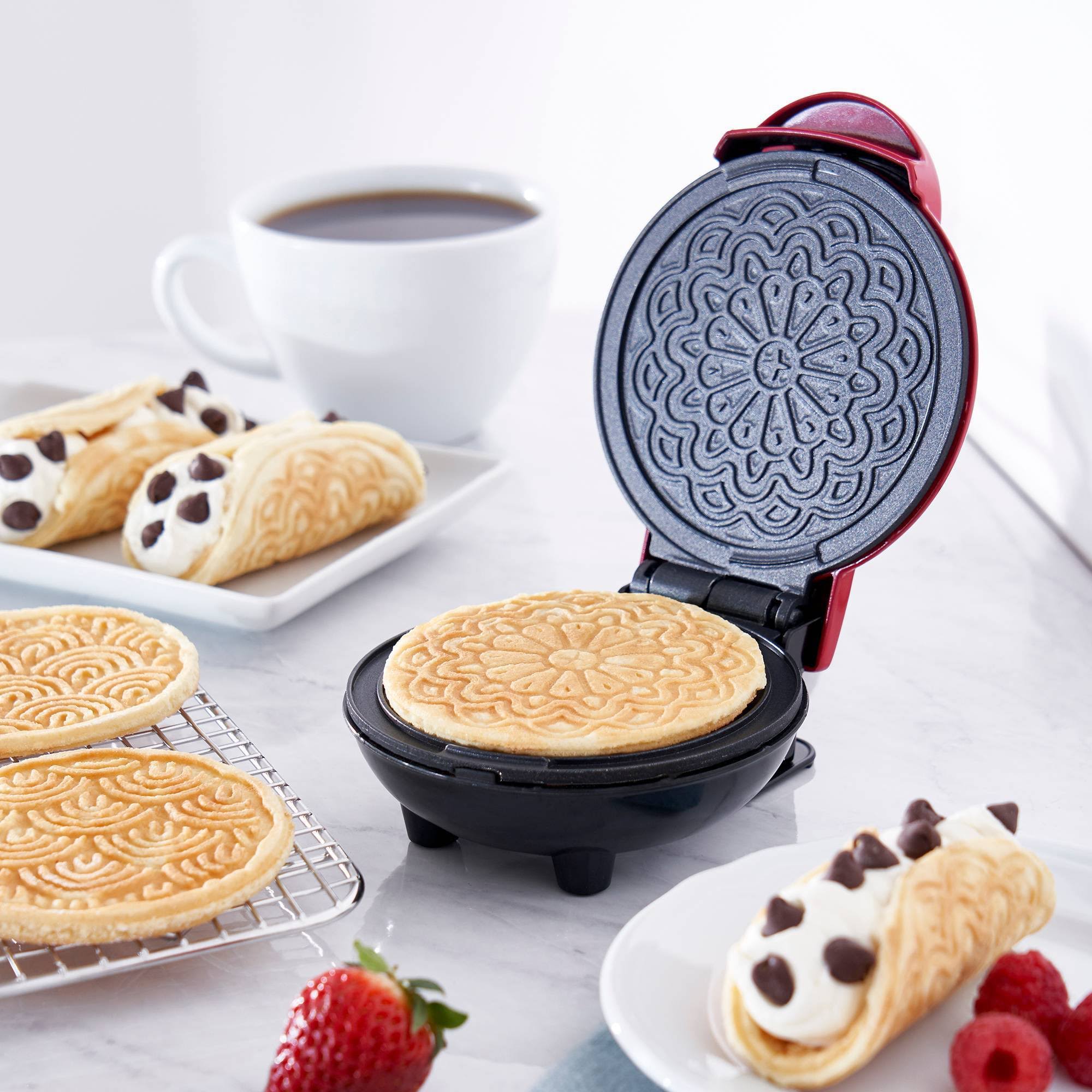 da71c09c34f6e92972f98a028b4f358db4ef96f48e147ba51a84b7d1c8deaa92.jpg Dash Mini Pizzelle Maker - Red - Image 1