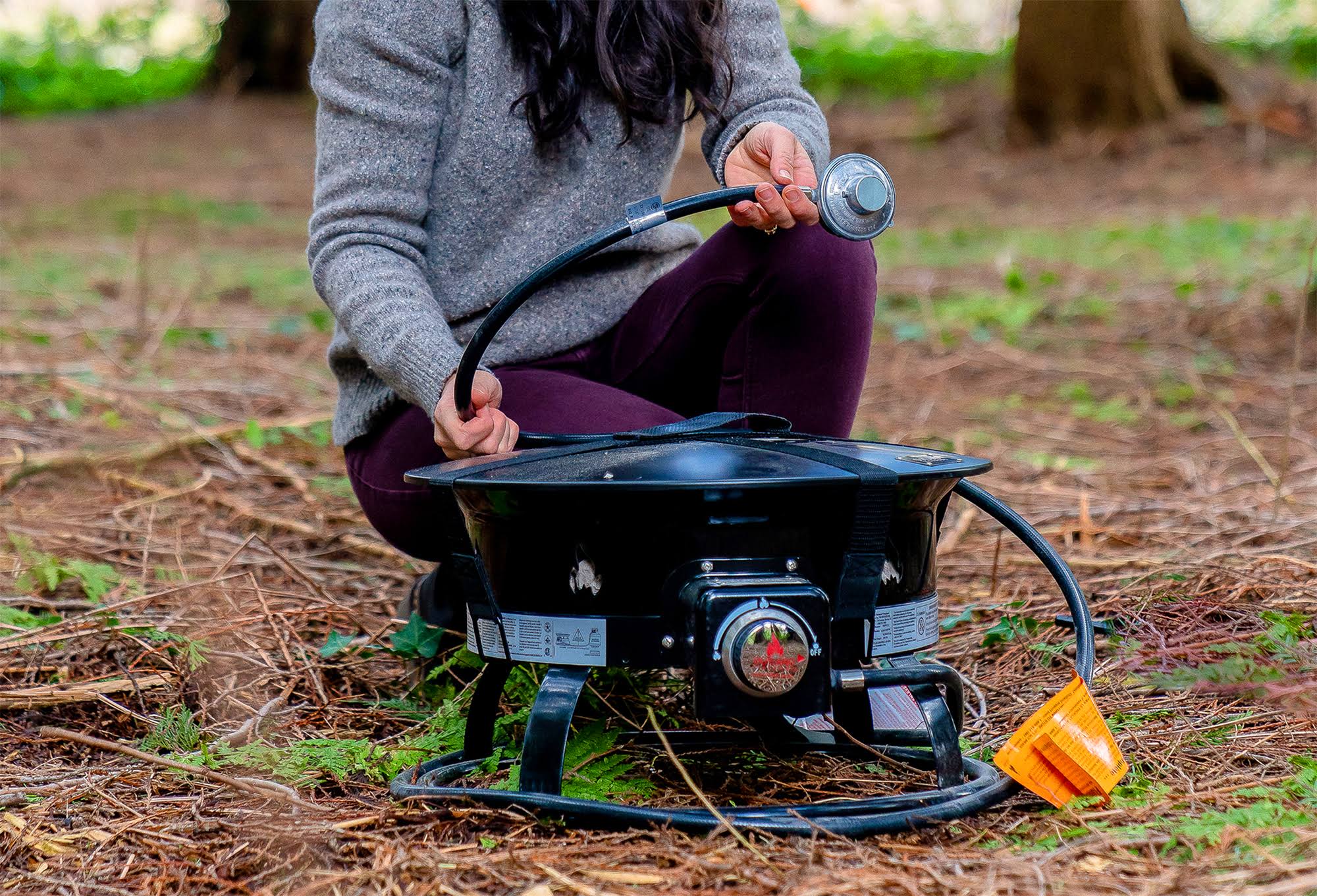 dc476aa1e3fab0b3a3e8669f65aa0f46220a771373d516746da2dc646e245368.jpg Outland Firebowl Deluxe Portable Propane Fire Pit, Black - Image 1