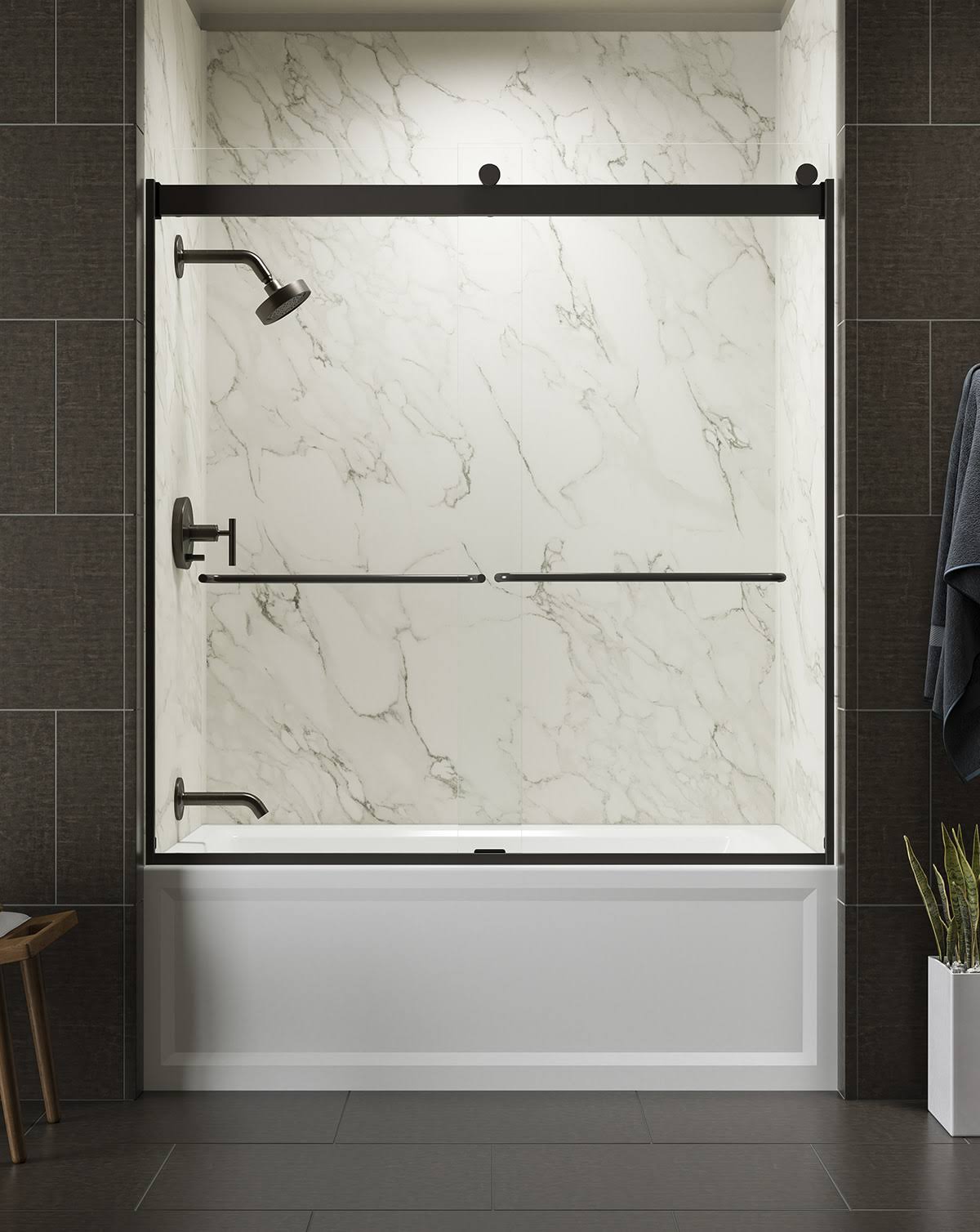 dc5fd46b61021b4225fbc420a713fa76ef7cd8a8353cc0e534ed55b21914f8ba.jpg Kohler K-706004-L Levity Sliding Bath Door, 62" H x 56-5/8 - 59-5/8" W, with 1/4" Thick Crystal Clear Glass - Anodized Dark Bronze - Image 1