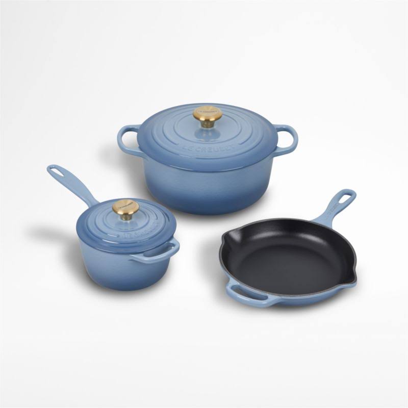 de3df1ec8ab46c2b5a1c4126db6d6ab0482ffbb4c46611bfa7ecacc2c43212b1.jpg Le Creuset Signature 5-Piece Chambray Cast Iron Cookware Set - Image 1
