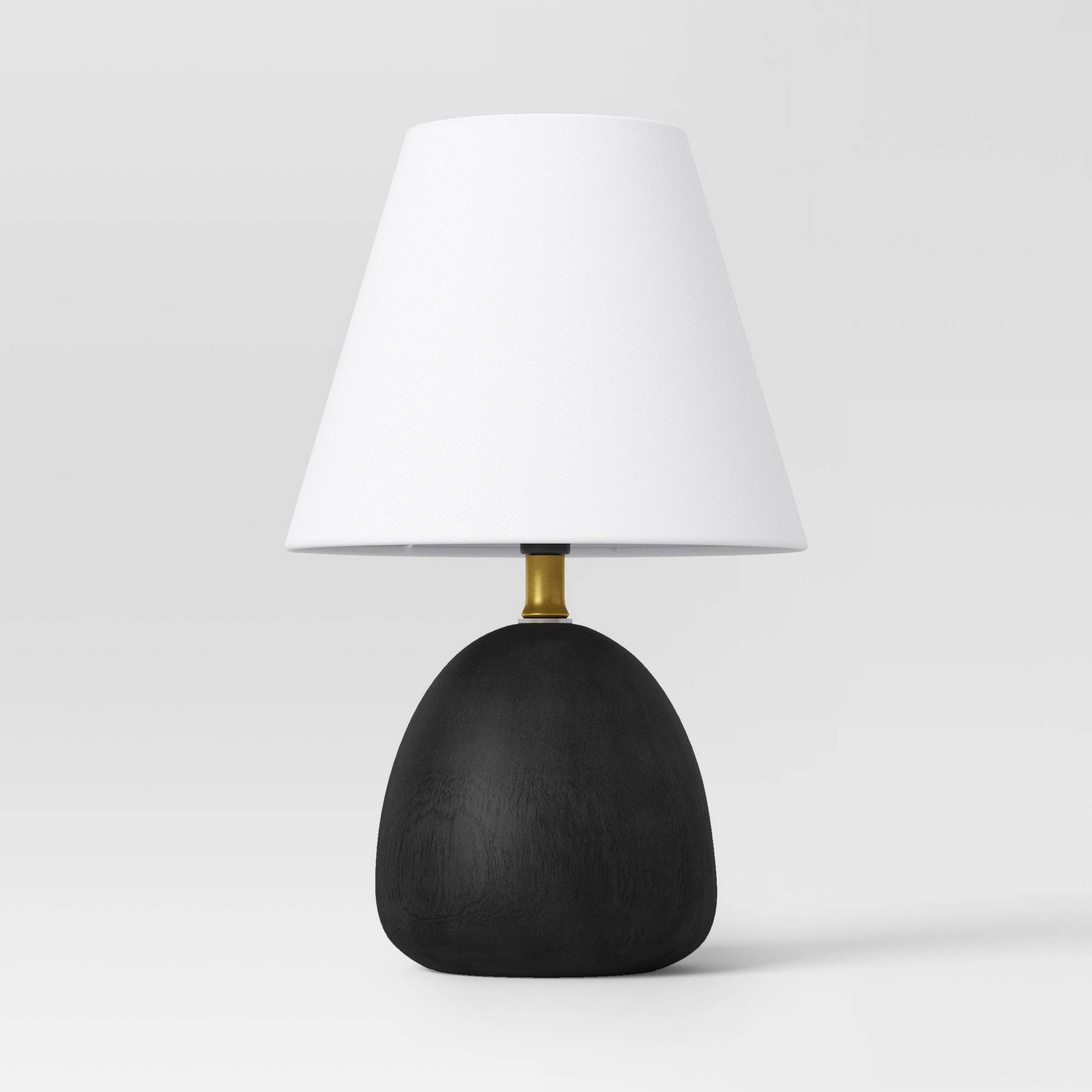 df2d70e32f8a821746ef359d52fe97695a3bb565d3a4a515cf5430ef4b501fb5.jpg Faux Wood Mini Table Lamp Black - Threshold - Image 1