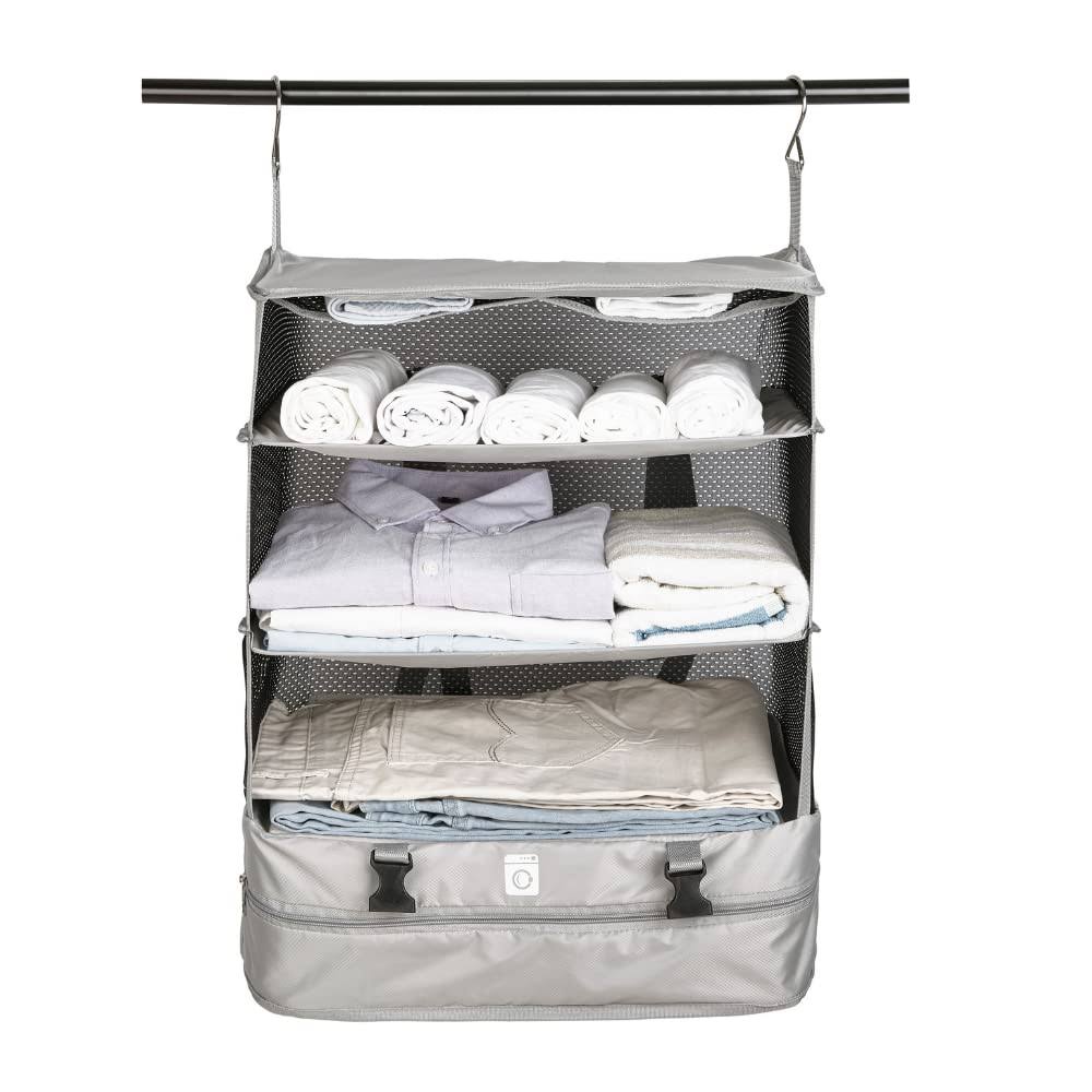 e2b63b33a391abdb56e5c2128dac0b18ea928679c0daa448910603bcb2cd54ab.jpg S3 The Brand Stow and Go Suitcase and Travel Luggage Organizer. A Portable Hanging Closet for Easy Garment Packing and Clothes Shelves Organization S - Image 1