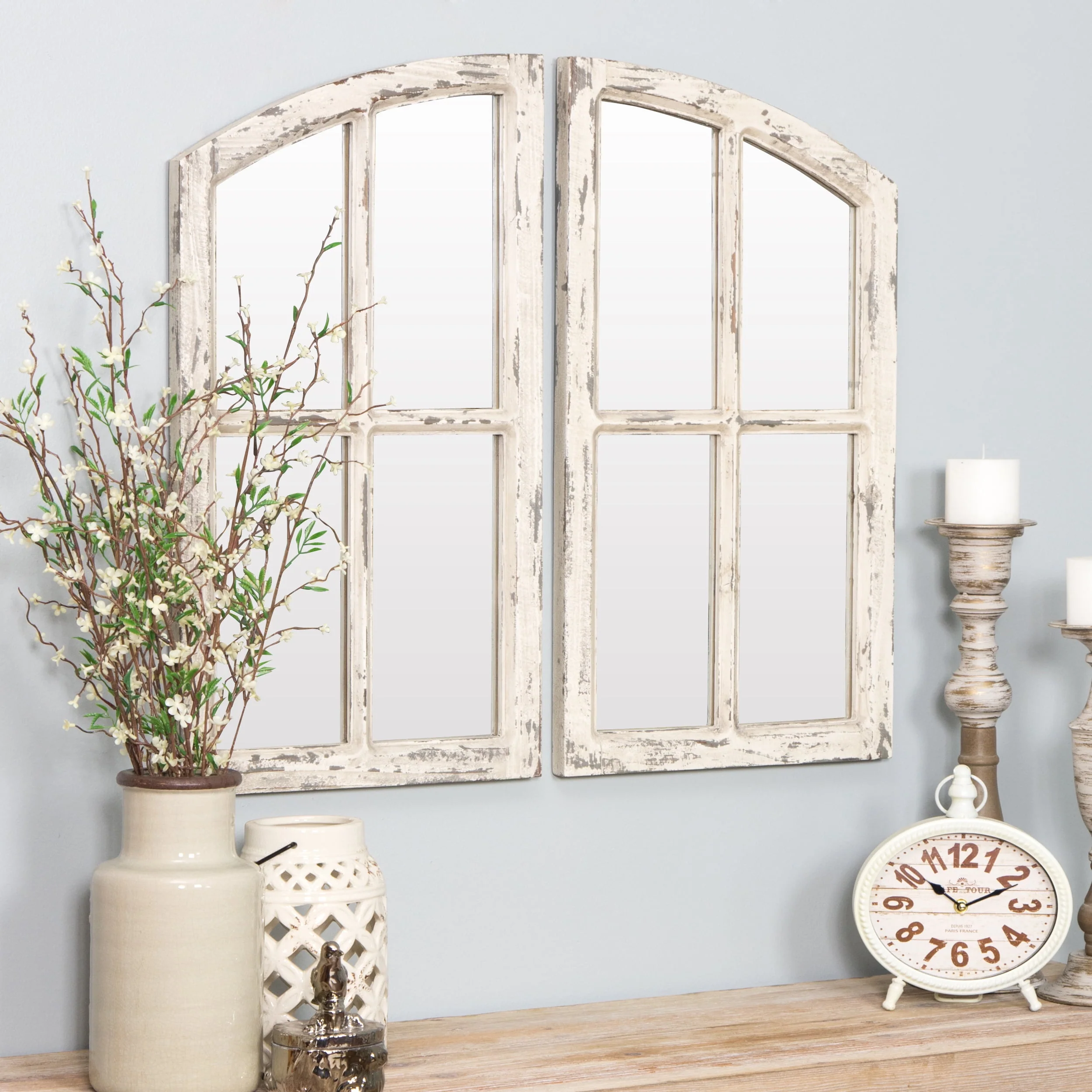 e391e3345e1f89f7c66492547882a26847ba1c37fa25cb75b3147ab692864f3e.webp Jolene Arch Window Pane Mirrors Off - White 27" x 15" (Set of 2) by Aspire - Image 1