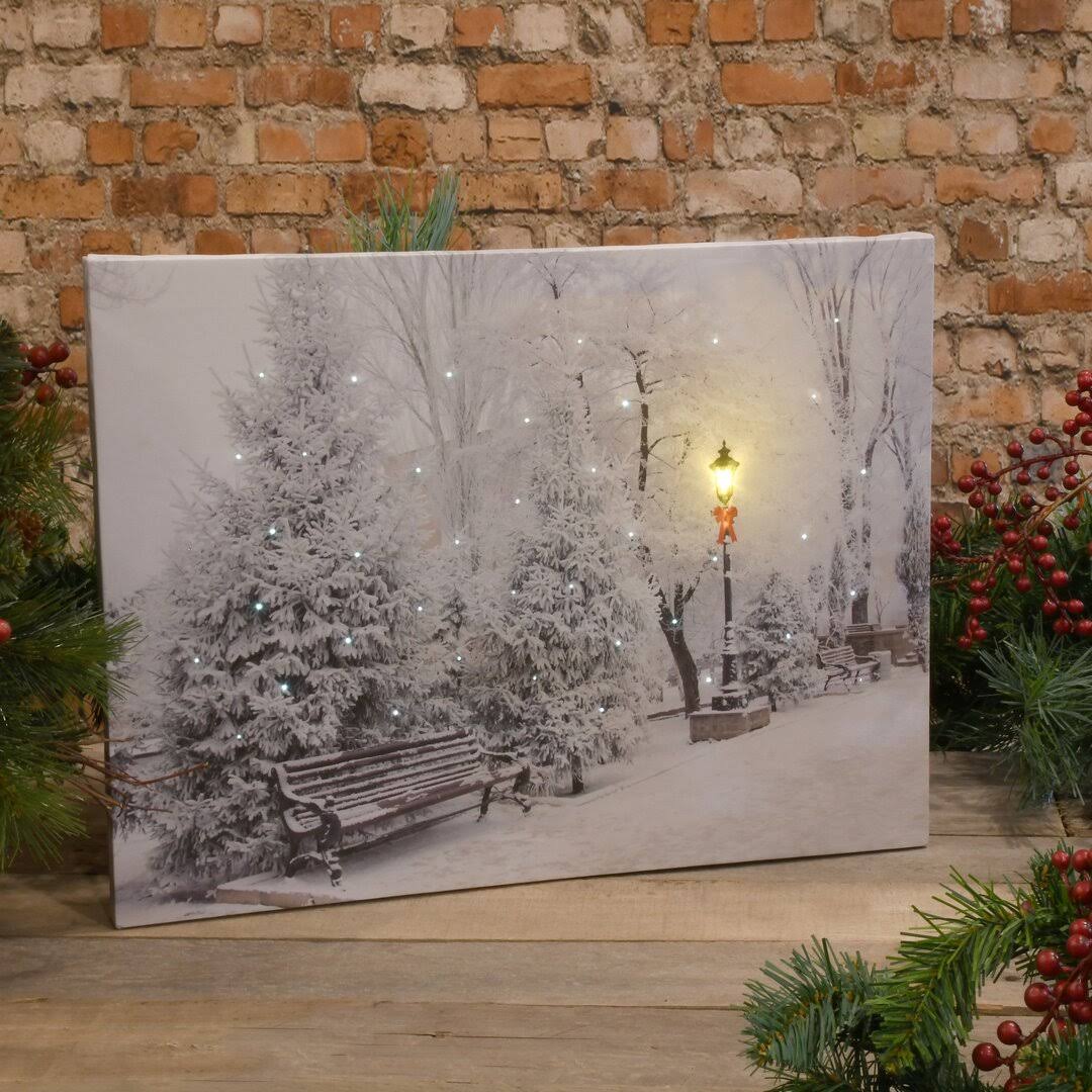 eab28f699d29d81f7742ba69cfc09031712a074972ed8db8207a29566039aacd.jpg Lumabase Battery-Operated Lighted Wall Art - Winter Wonderland - Image 1