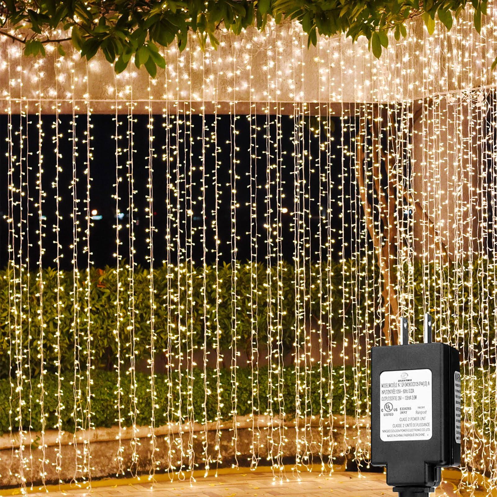 ece4d42ef8923acdc990ed947d0727db5a0d3ef62e10a448cf4d39ea85569c90.jpg Solhice LED Curtain Lights Outdoor 40ft x10ft, 800 LED Plug in Hanging Window String Lights Indoor, Twinkle Lights Backdrop for - Image 1