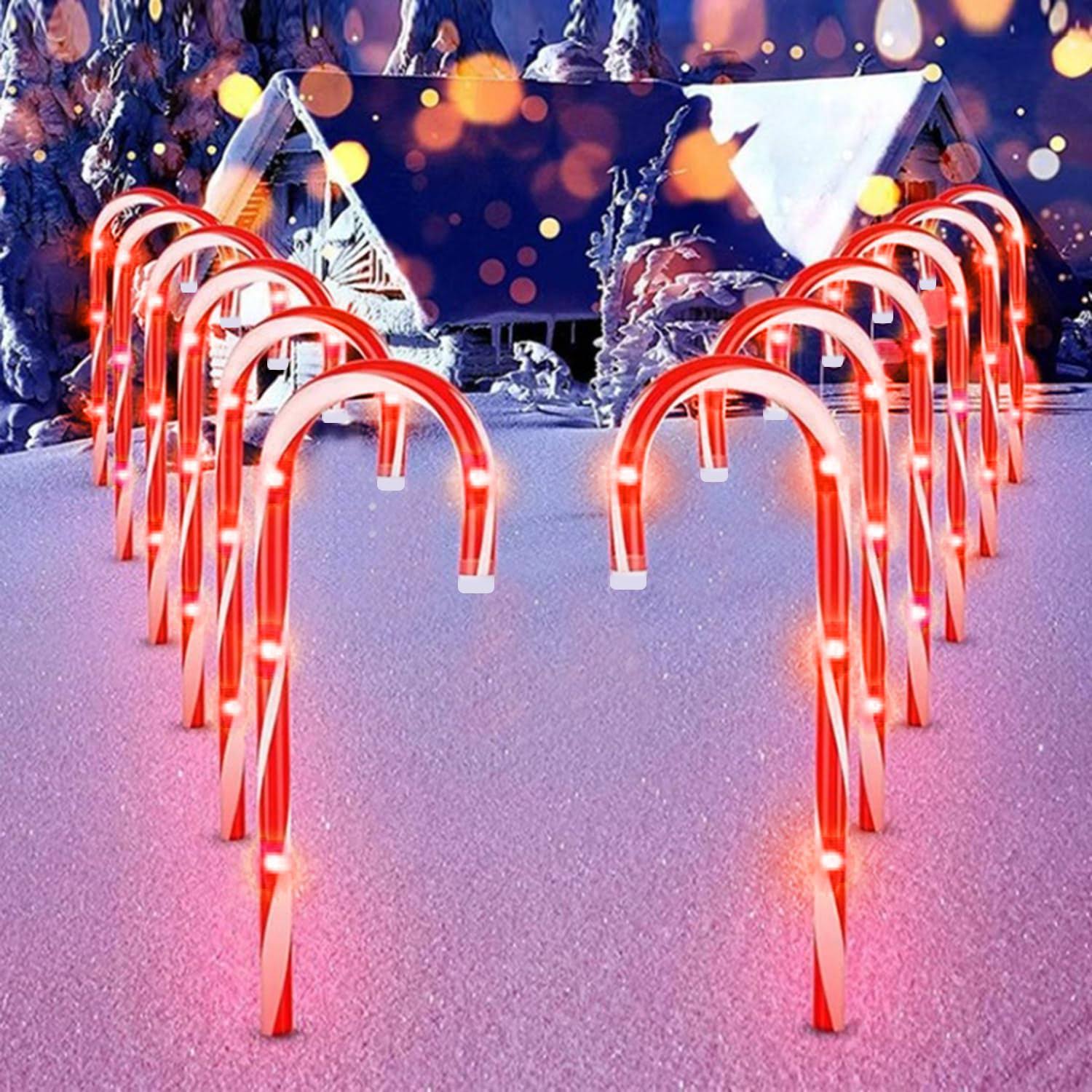 ef9b075a27e5564ecf95721504d5c5b2e2943e600426b444887cba65fe3a16b8.jpg Christmas Candy Cane Pathway Makers Lights, 10 inch Set of 10 Candy Canes Lights Outdoor, Candy Cane Lights Christmas Decorations Outdoor - Image 1