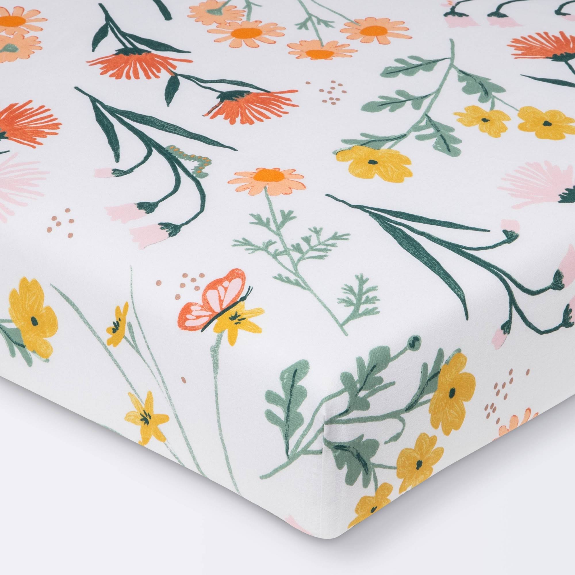 f00960934e424eaf9b36f127e528d28cf76e5fe82204f5d1cb9ee56928309757.jpg Cloud Island Fitted Garden Floral Crib Sheet | Target - Image 1
