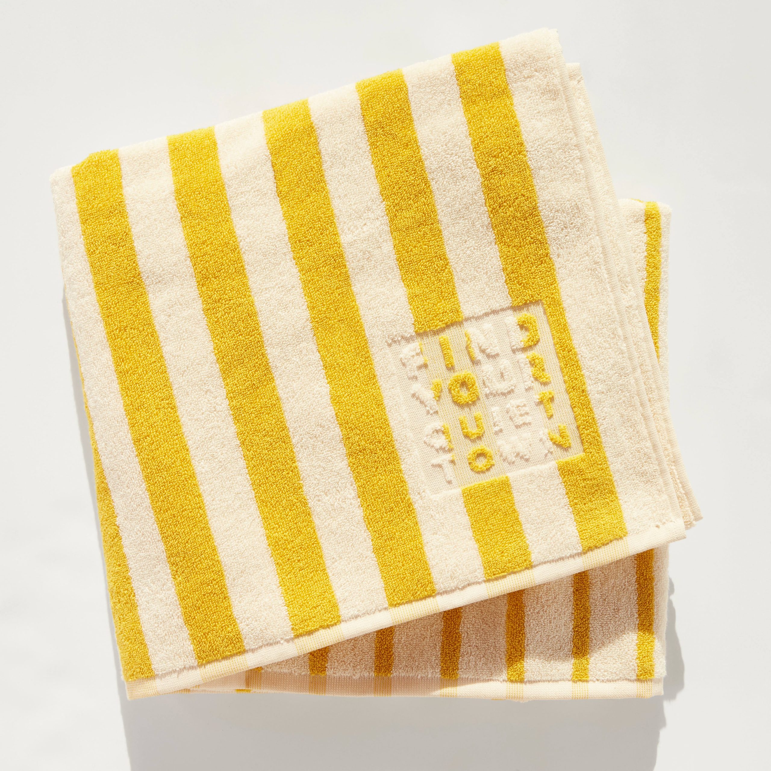 f1b66bda9b916769eac1ee97048b2fa0424e03b571eecd8f675d60d64ec30284.jpg Ojai Towel Hike | Yellow Cotton Bath Towel | Quiet Town - Image 1
