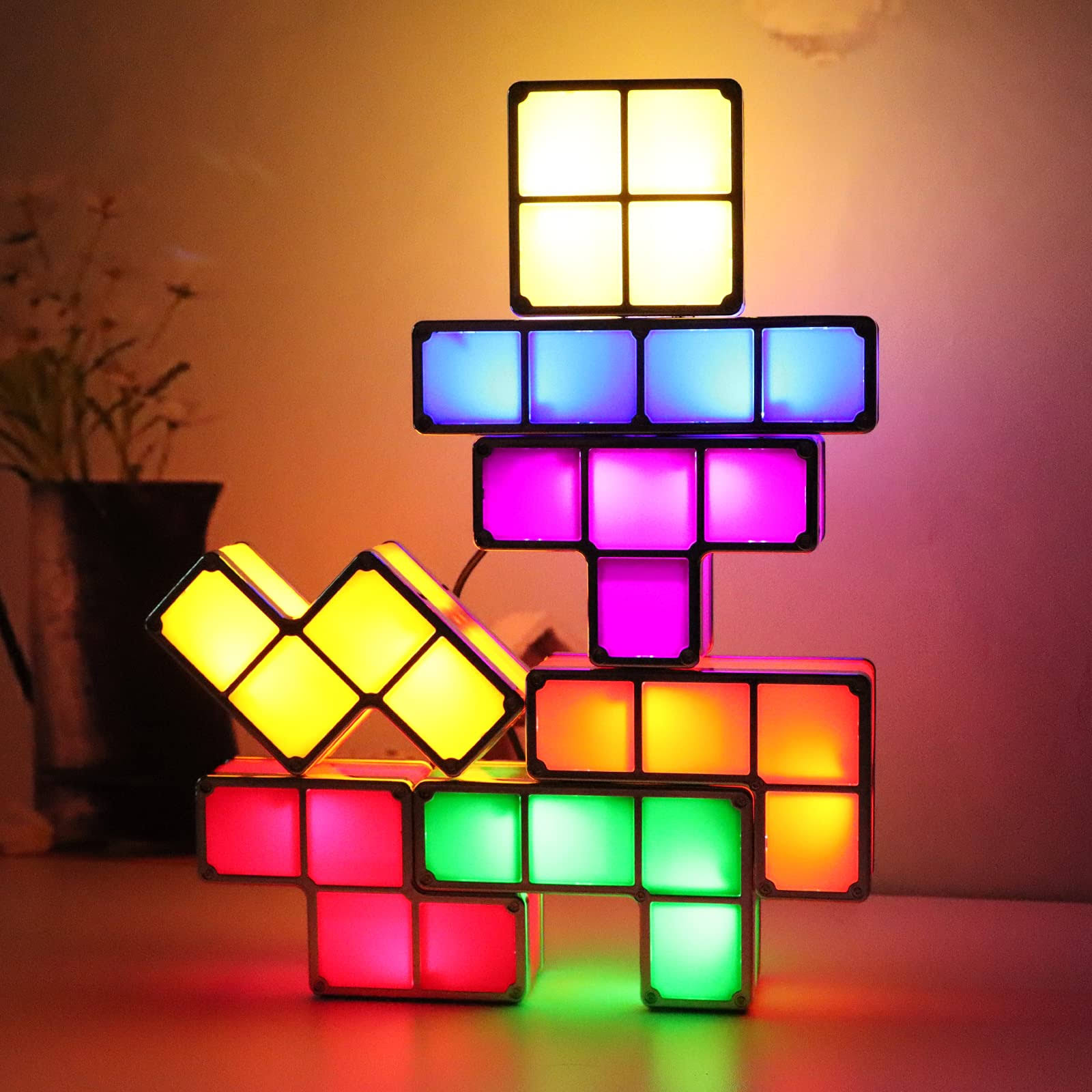 f23d3b56cd343754ba373abbaf2e4a0e890cbe76ce4c551af2b59185e6592858.jpg VEEKI Night Light for Kids, Stackable LED 7 Colors 3D Puzzles Night Light Induction Interlocking Desk Lamp, DIY Tangram Light Blocks Puzzles Lamp - Image 1
