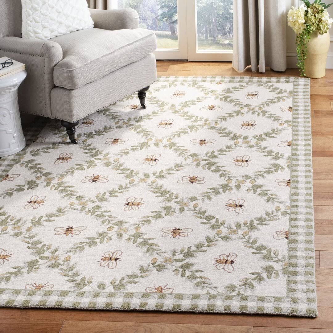 f3c6fe5a3d7cd725cfc2526cc3b3ab12409fcdf051ad6c665253f98d664023a8.jpg August Grove Littell Hand-Hooked Wool Green Area Rug Size: Rectangle 3'9 inch x 5'9 inch - Image 1