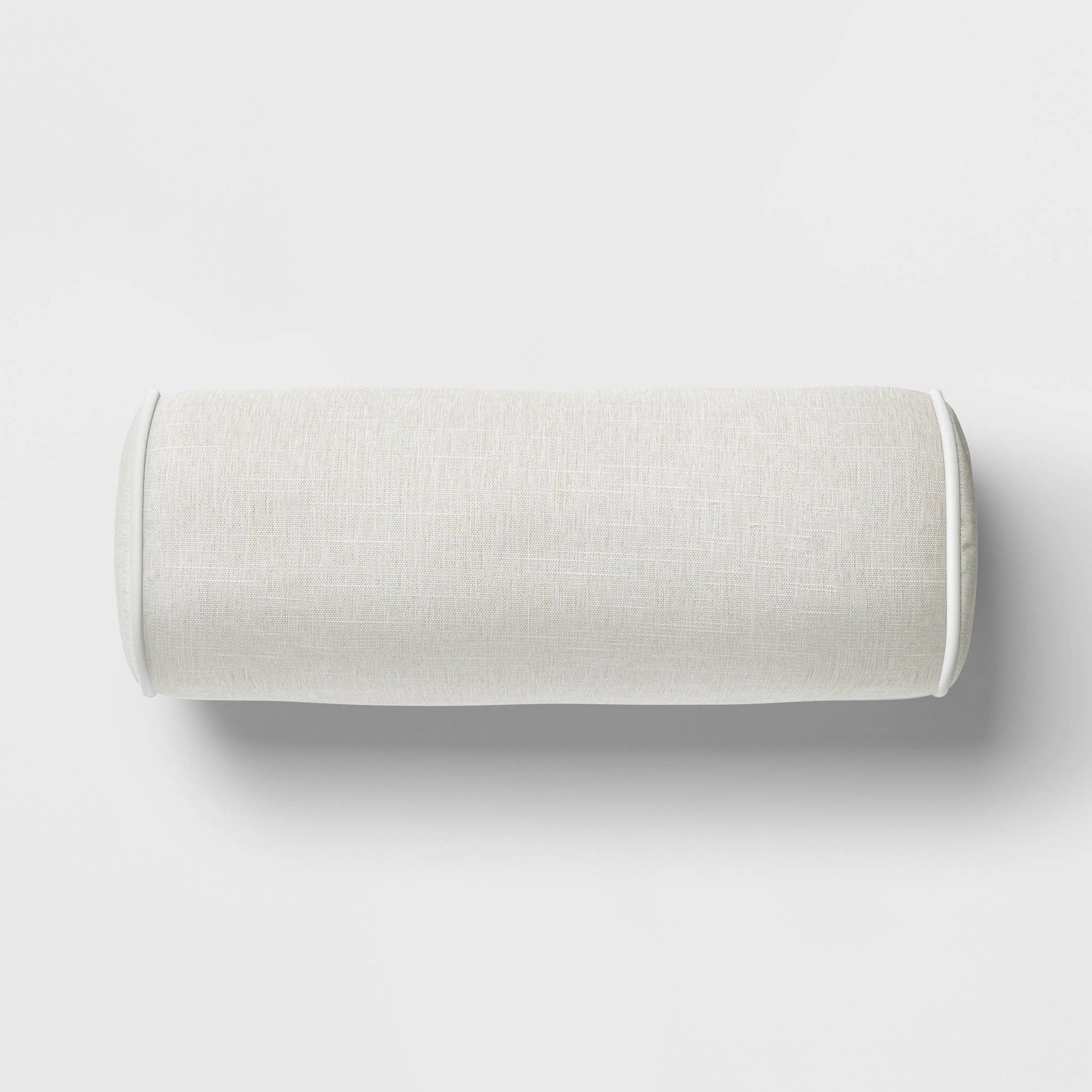 f457a720d0f73c674c9c87ff10290636308c2340fbbb6c6eb8c5aab9da4f5637.jpg 20"X8" Solid Cylinder Outdoor Bolster Pillow with Contrast Piping Tan - Threshold Designed with Studio McGee - Image 1