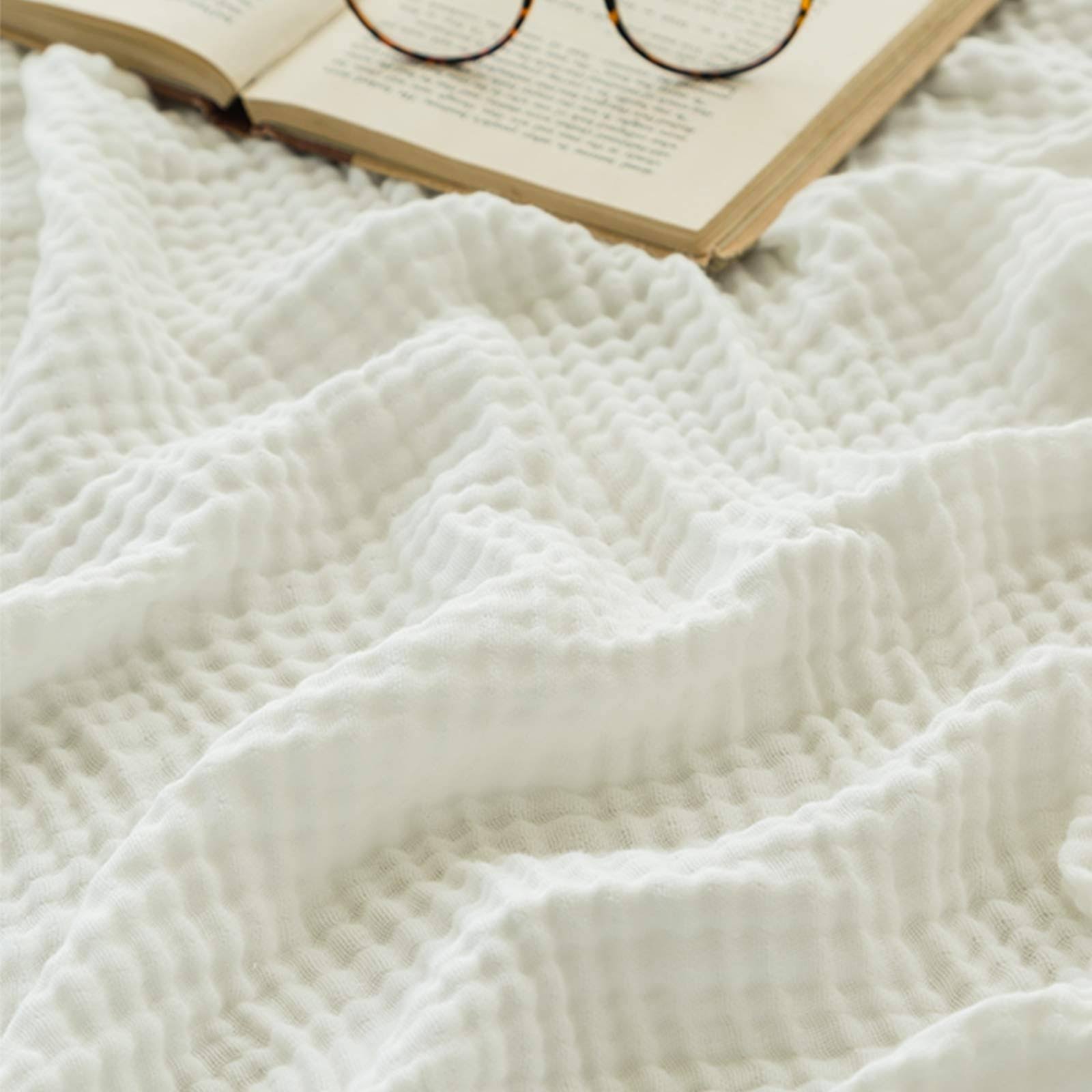 f47683f3ea23d6518aeb7fe3f200e9123ffc8d4a62a31c1996385d825acad2f8.jpg Emme Muslin Blankets Cotton White Throw Blanket for Couch 4-Layer Gauze Blanket Breathable Gauze Blanket All Season Soft and Lightweight Summer - Image 1