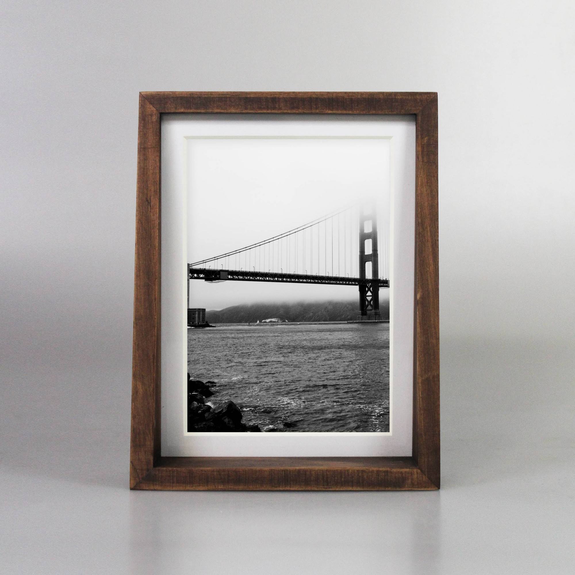 f6131a47d153cac5f7df9ef7a25d1e4b21b1a47d6338ff5f59bca80fc8cb6c68.jpg Project 62 Matted 6.5" x 8.5" Stained Walnut Frame Tabletop | Target - Image 1