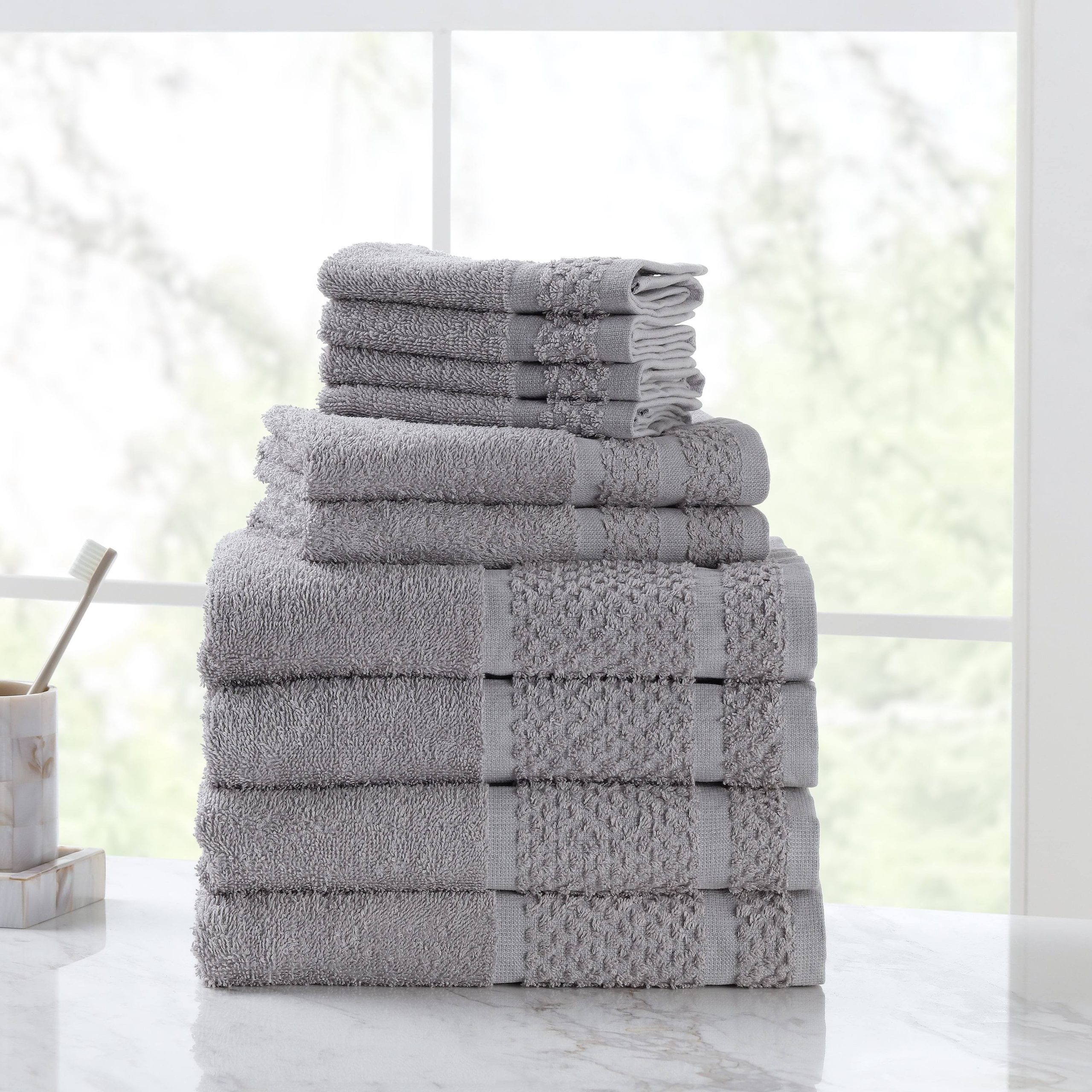 f83814dde0a563afc80e3b6650950b258001aede78f2326851c3bb2f34dd77be.jpg Mainstays 10 Piece Bath Towel Set with Upgraded Softness & Durability, Gray - Image 1