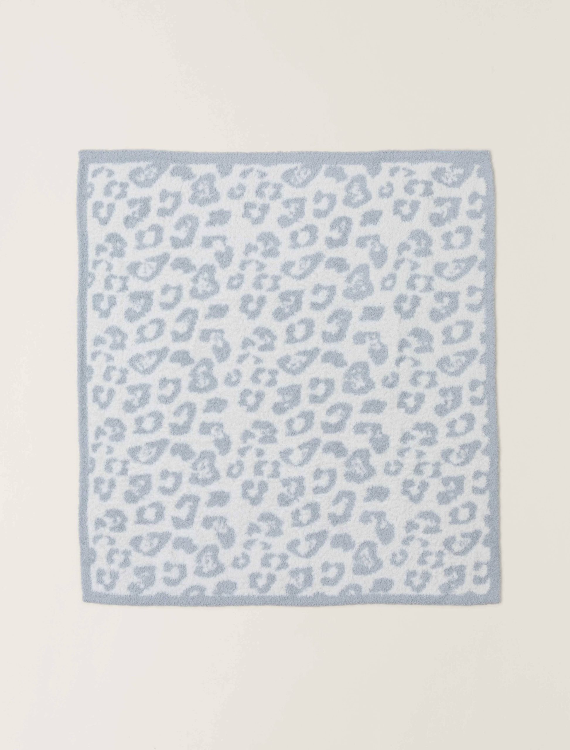 fcae97ef1be9bcd062c3e8fe45b7b04263aa76bfcbe53292e9abcf4d3888f6c2.jpg Barefoot Dreams CozyChic in The Wild Baby Blanket Ocean/Cream - Image 1