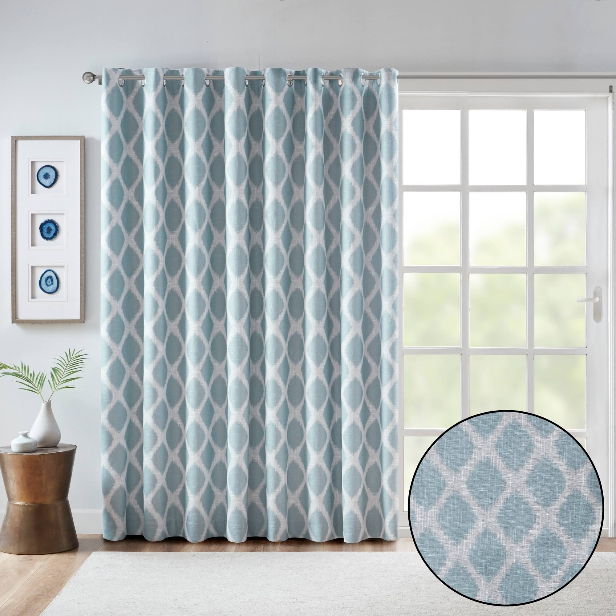 fd488b94cc4d755715e671af89ca5b506cf663ff7280b253a0755acf05b9d552.jpg SunSmart Aqua Blakesly Printed Ikat Blackout Patio Curtain - Image 1