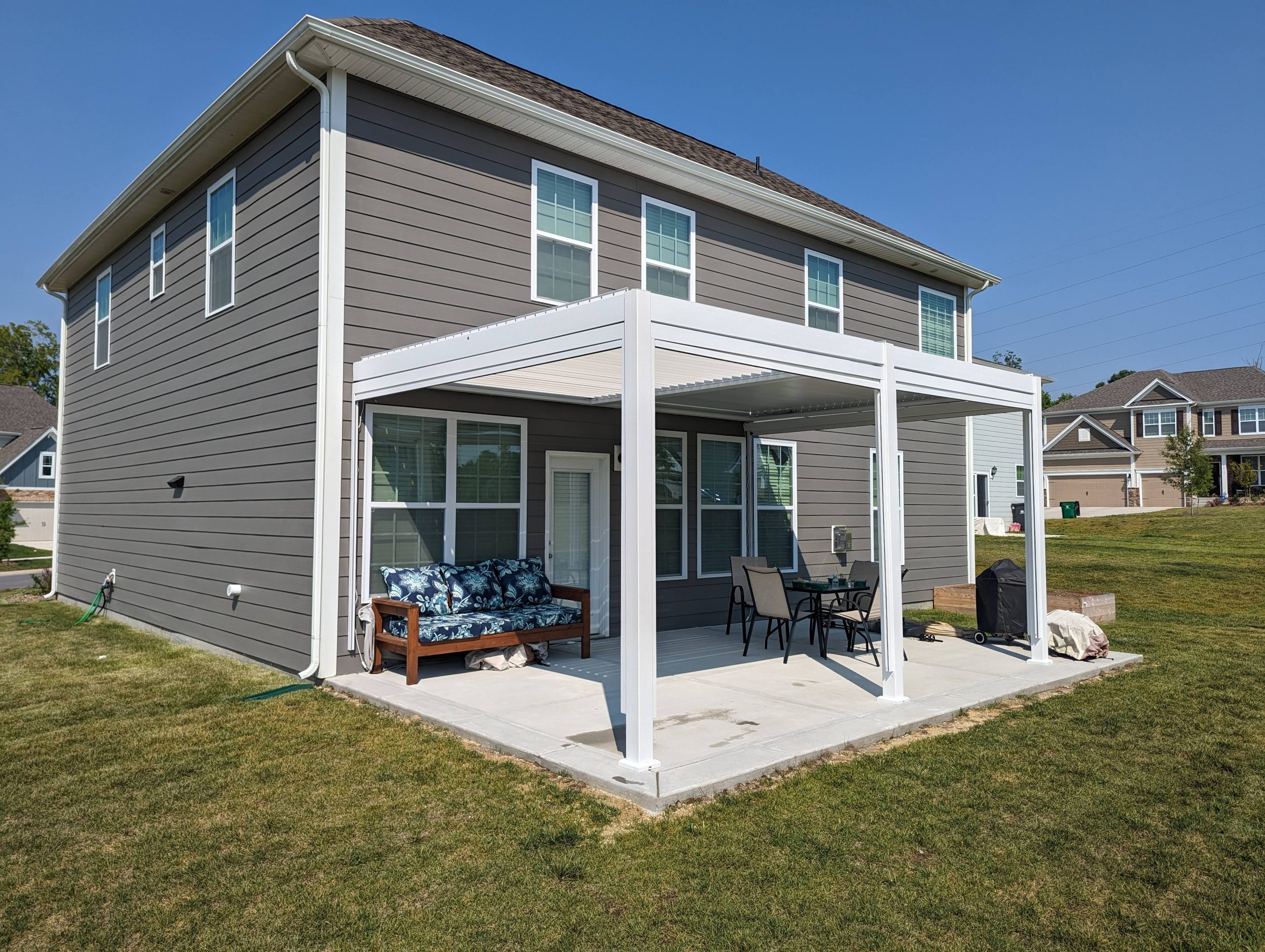 fd89186d8deebb8065dc22cc13e2bc6875580466027259787186b2bcc9e4c9f9.jpg Freestanding Villa Pergola with Motorization and LED Lighting Included, 19' x 13', White - Image 1