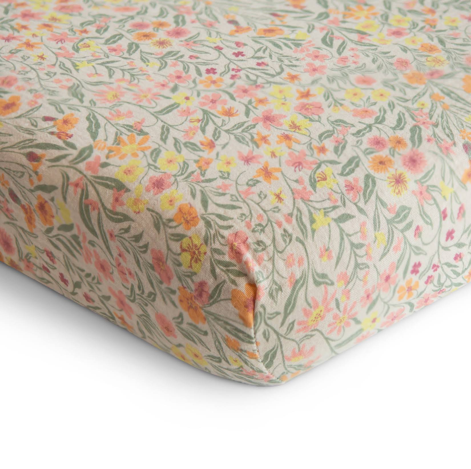 fdd1ce0afad02b3bdeeac98c8e3fa5c67eb9b2871808255e7463afa119fef341.jpg Mushie Extra Soft Muslin Crib Sheet Pastel Blooms - Image 1