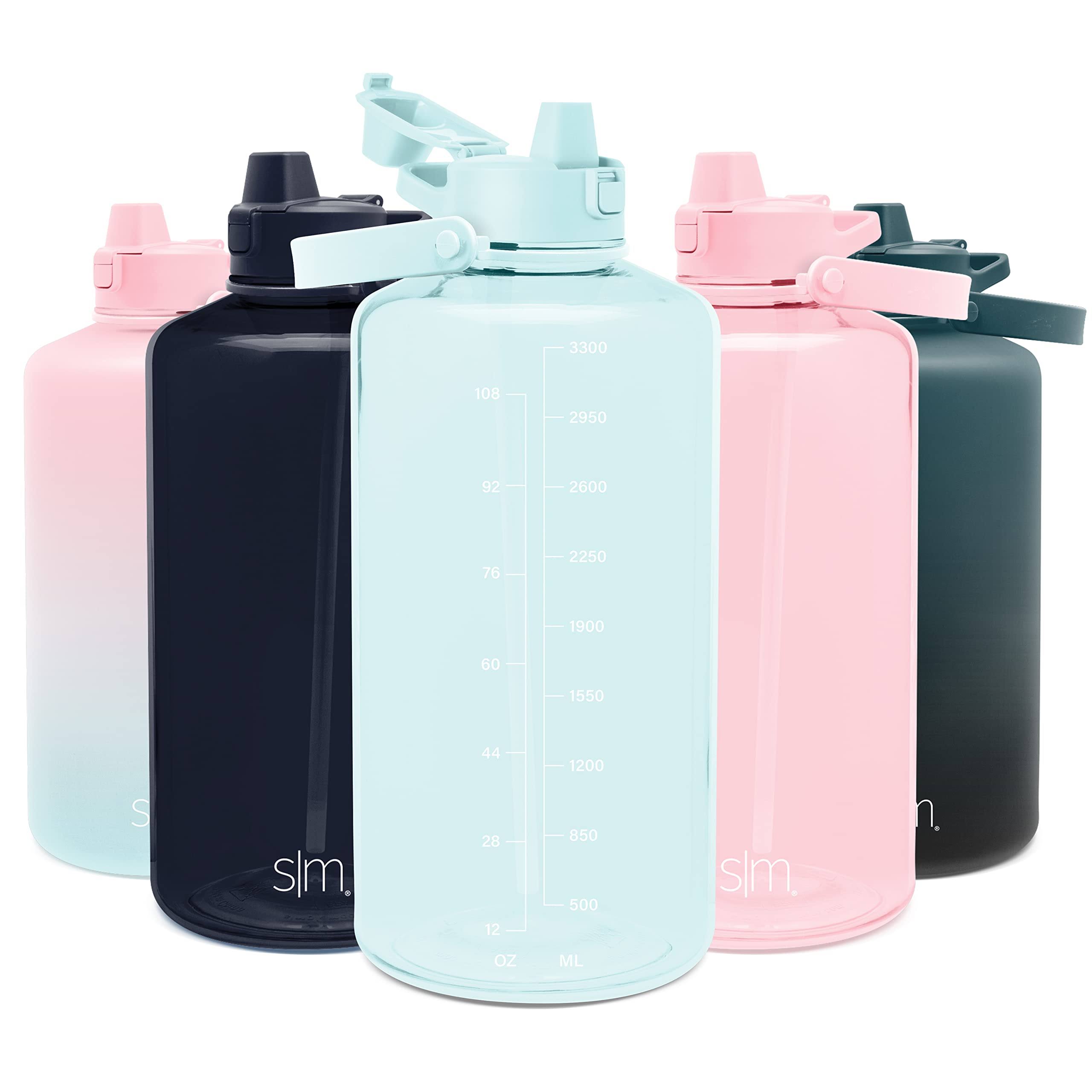 feec8b7a8accffbdd1353e627a94baa129f81a3e34297ffb41f6e810bba44f6a.jpg Simple Modern 1 Gallon 128 oz Water Bottle with Push Button Silicone Straw Lid & Measurements| Tritan Plastic Water Jug | Summit | Seaside - Image 1