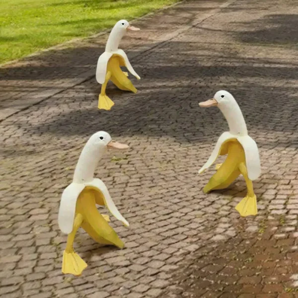 RICEFINE Banana Duck Sculpture, Whimsical Banana Duck Yard Art, Creative Banana Duck Art Statue Garden Yard Outdoor Decor (1 Pc) 1