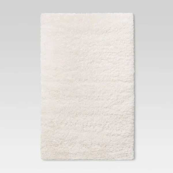 4'x5'6" Cream Plush Shag Washable Accent Rug - Room Essentials