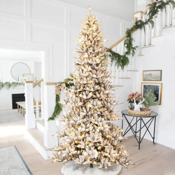 Glitzhome 11ft Pre-Lit Snow Flocked Slim Fir Artificial Christmas Tree with 950 Warm White Lights